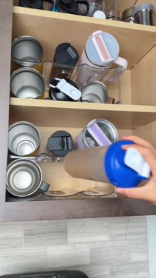 Magnetic tumbler lid organizer, shelf mounted